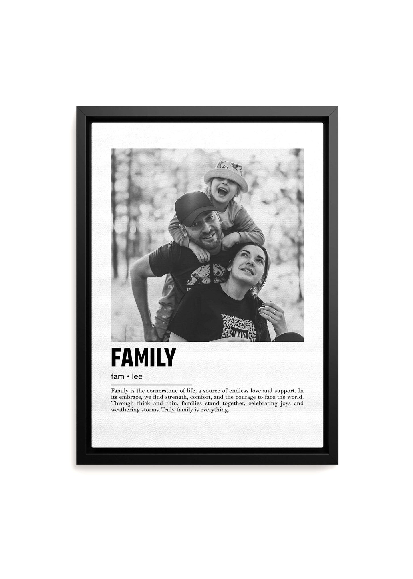 Personalized black and white photo gift on black framed canvas with custom caption on white background.