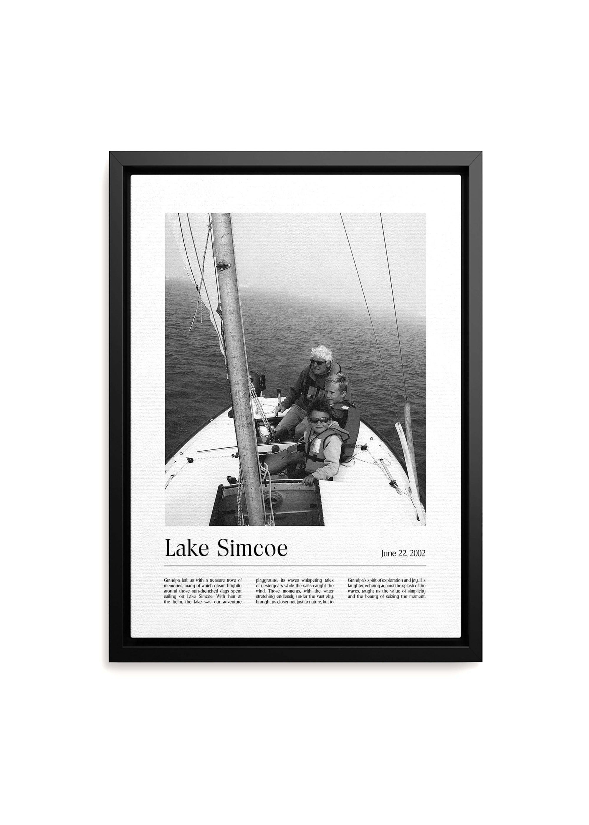 Personalized black and white photo gift on a black framed canvas of children with grandpa sailing. The canvas is on a white background and has a custom message inscribed on it.