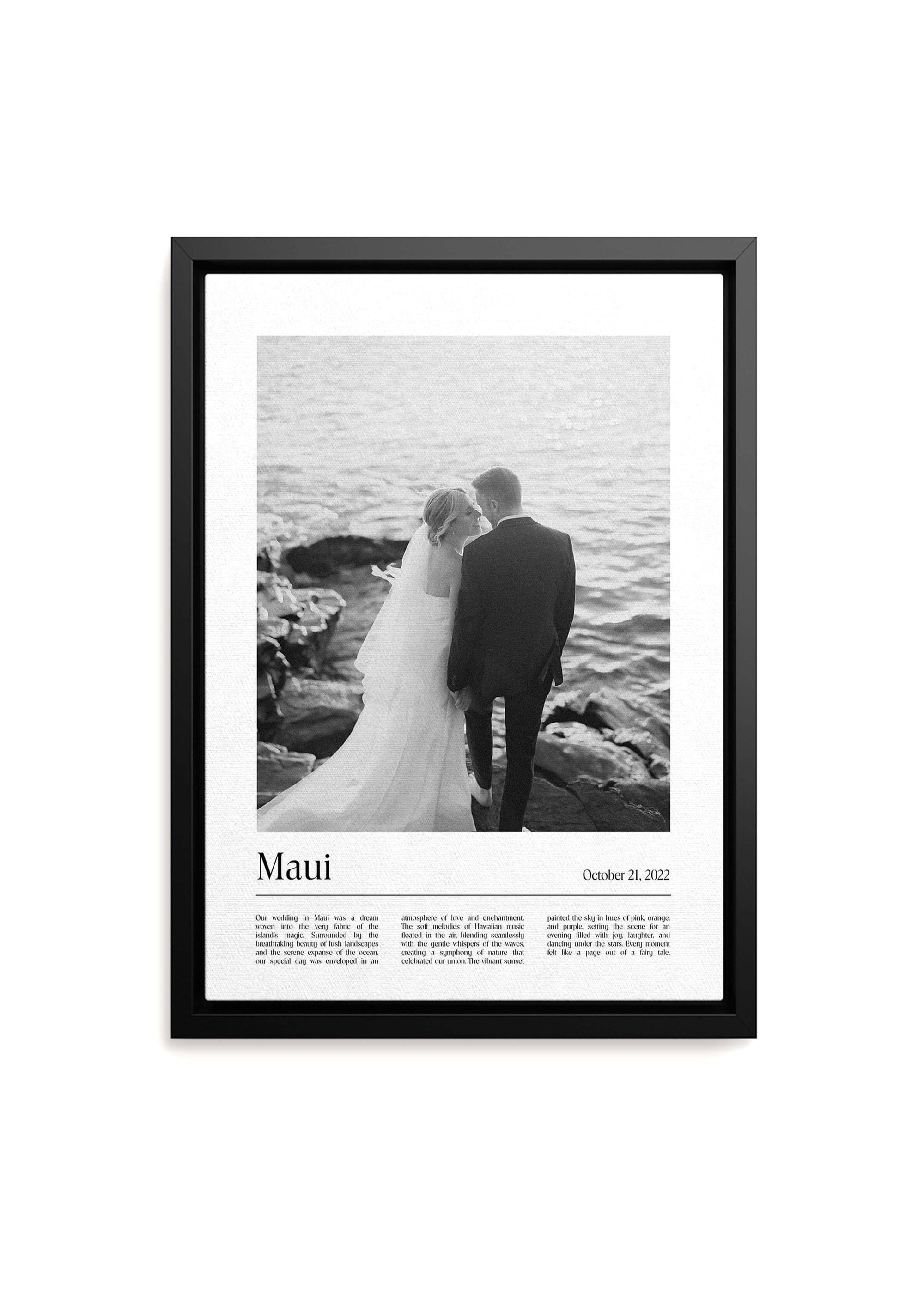 Anniversary gift canvas of a black and white photo of a wedding couple by the sea with a custom message added. The black framed canvas is on a white background.