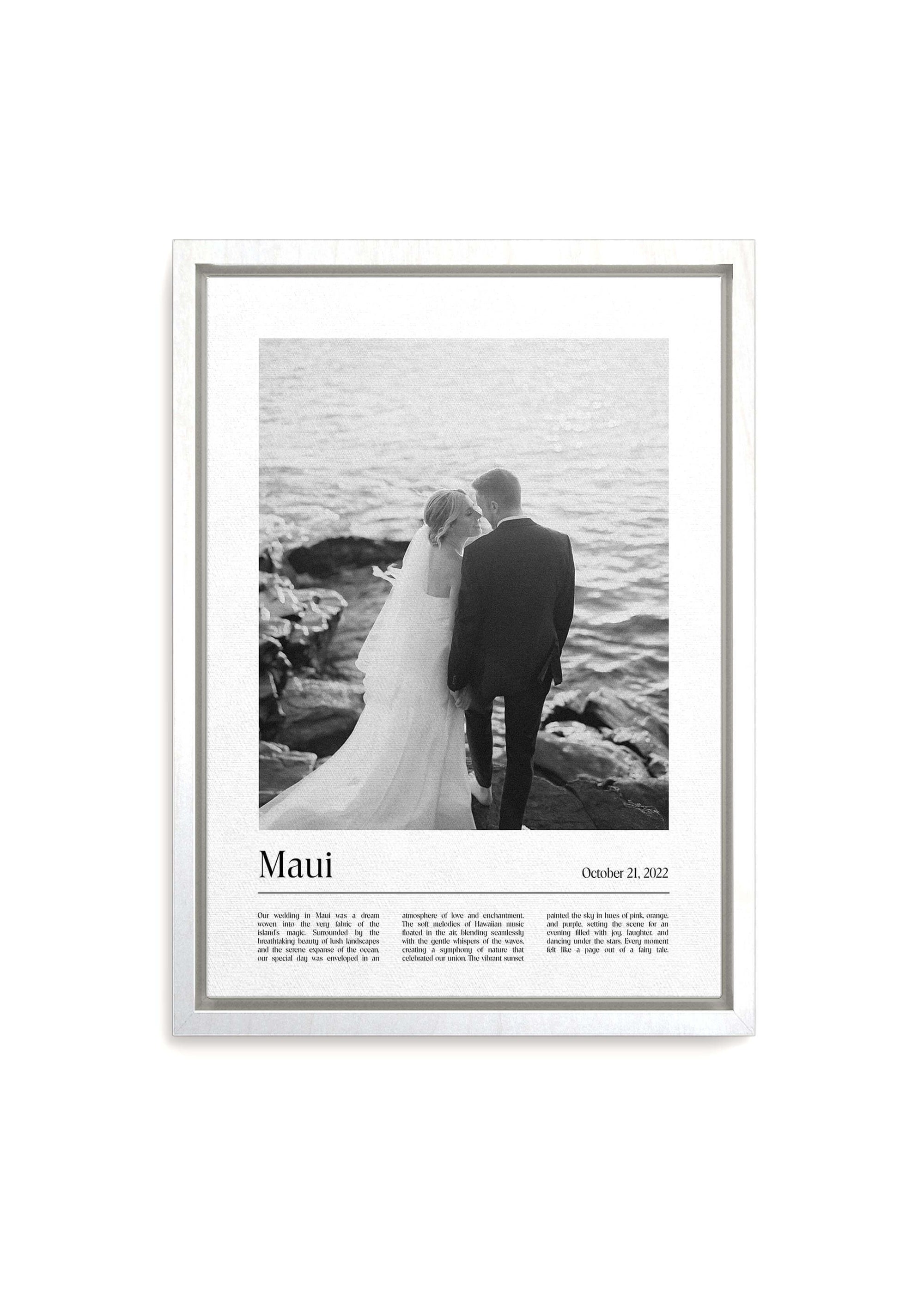 Anniversary gift canvas of a black and white photo of a wedding couple by the sea with a custom message added. The white framed canvas is on a white background.