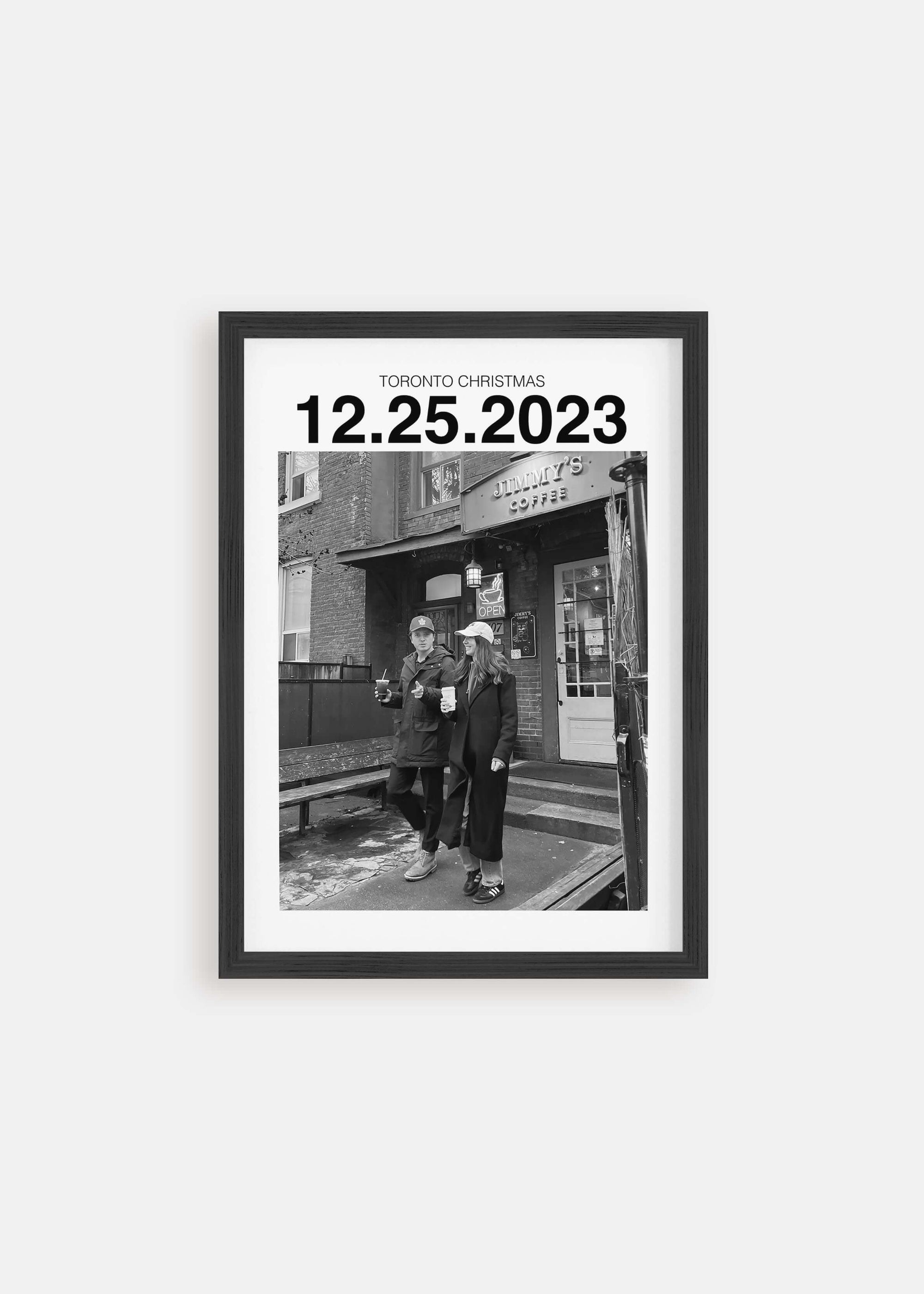 Personalized black and white photo gift with custom date in black frame on white background.