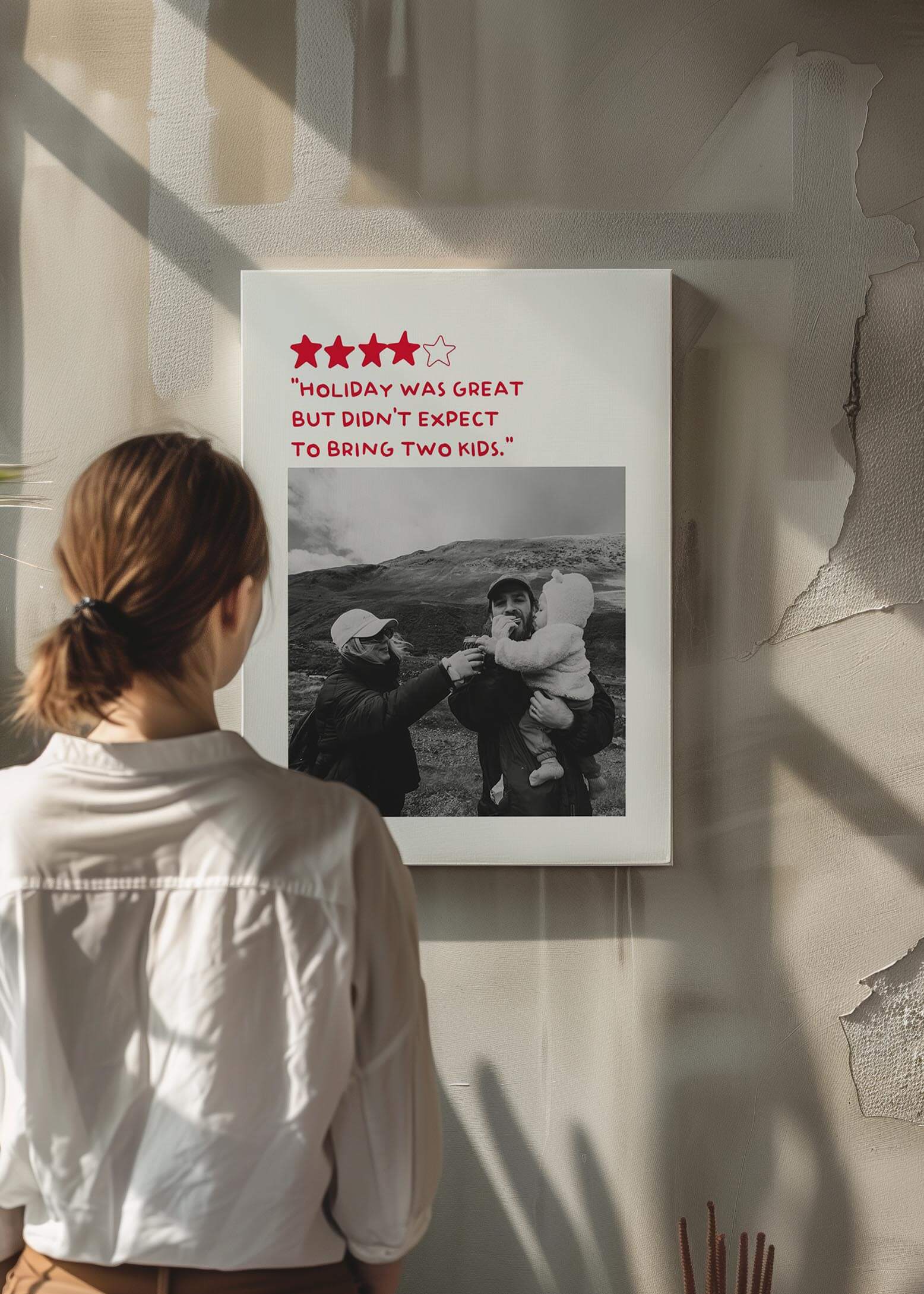 Woman looking at a personalized photo 5 Star Review Canvas on a raw concrete wall